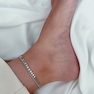 پابند آويزدار طرح دايره نقره اى 