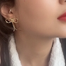 گوشواره طرح پاپیون مارپیچی